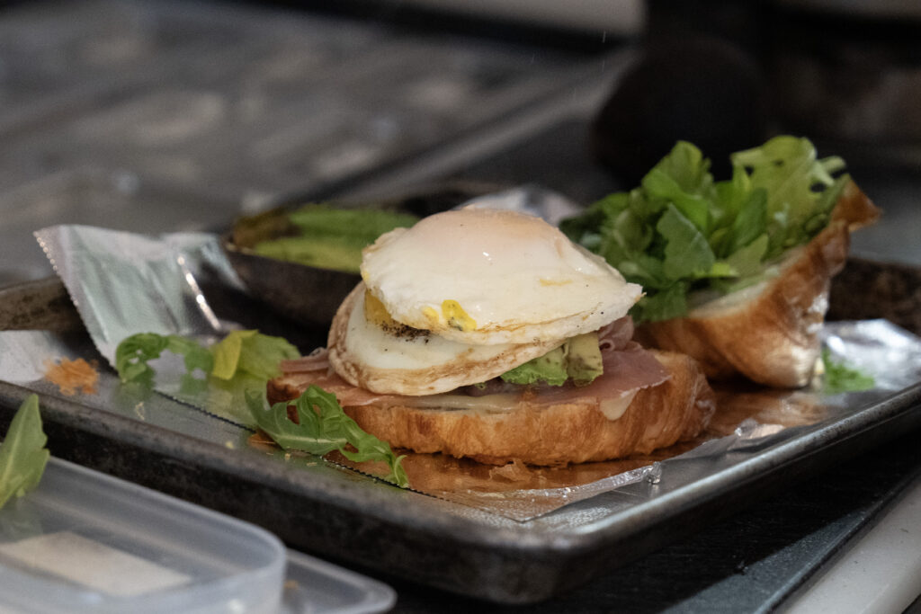 AP Breakfast Sandwich from Khepri Cafe, featuring locally sourced ingredients on freshly baked bread